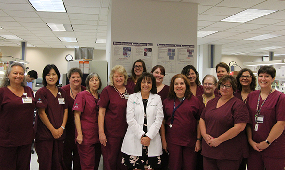 Group photo of medical professionals in lab