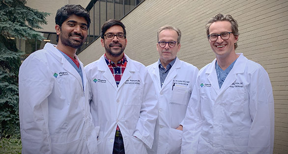 image of interventional cardiology graduates class of 2020 smiling outside of allegheny general hospital