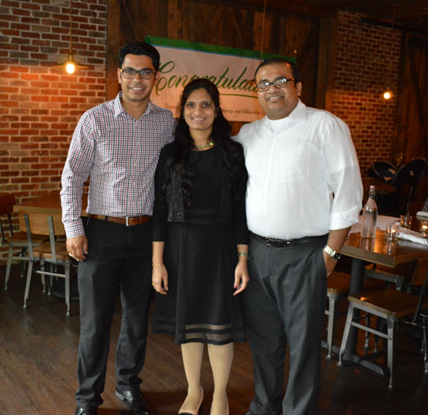 Three nephrology fellows standing together in restaurant