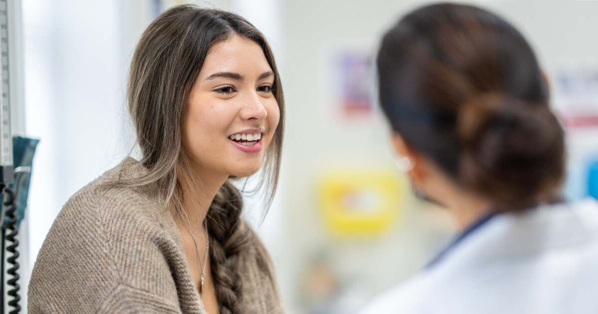 Female patient speaking with female physician