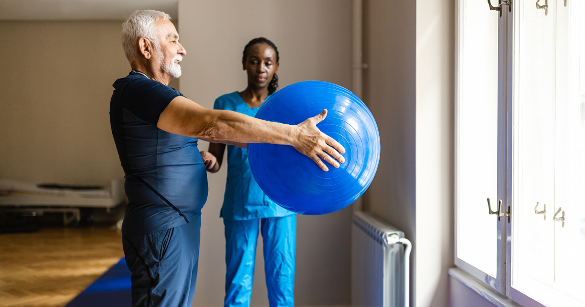Man holding exercise ball