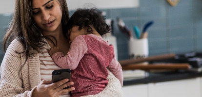 image of a woman with a baby using the mychart mobile app