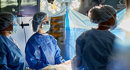 AHN surgeons performing surgery in an operating room.