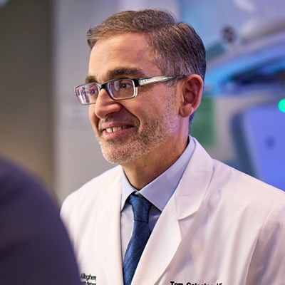 an AHN doctor smiling