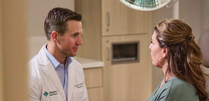 an AHN doctor discussing cancer screening with a patient