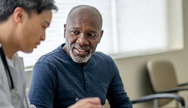 Doctor consulting with a patient about Kaposi Sarcoma treatment options