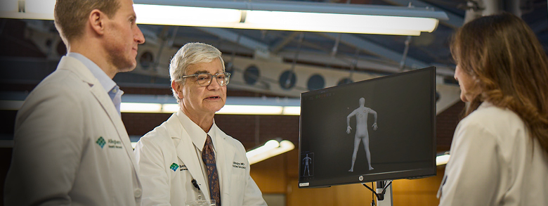 Medical team collaborating on patient referral for squamous cell skin cancer treatment at AHN.