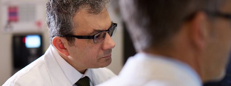 Doctors reviewing the results of a skin cancer screening.