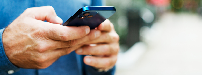 Patient uses mobile phone to schedule appointment for skin cancer screening at AHN transplant and High-Risk Clinic