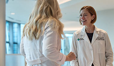 Two AHN cancer specialists talking.