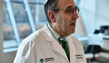 AHN cancer specialist talking to a person off camera.