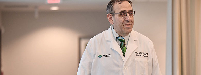 AHN cancer specialist standing in a treatment room.