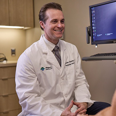 AHN cancer specialist talking to patient.
