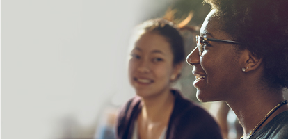 Two young women smiling