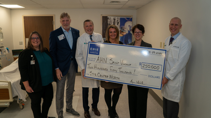 Officials of AHN Saint Vincent and The Erie Community Foundation share check presentation 