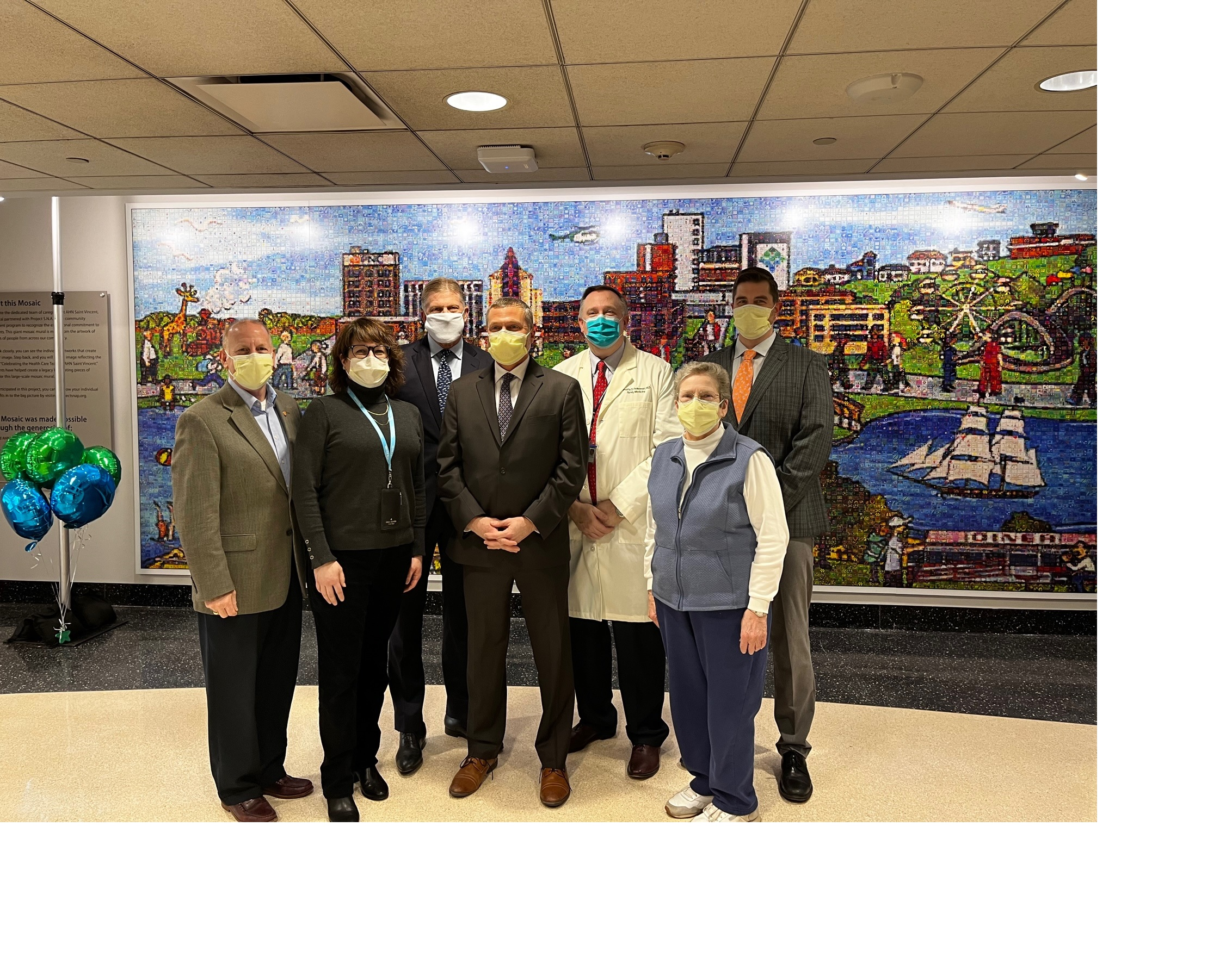 Group photo of Saint Vincent officials and mural sponsors