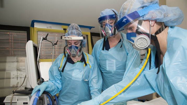 Nurses wearing elastomeric masks